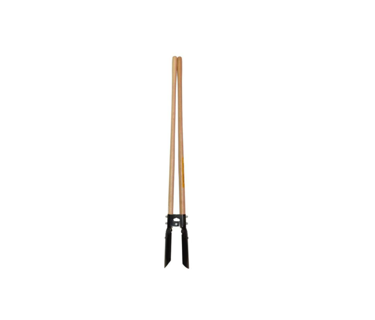 "Post hole digger in action, showcasing its durable design and efficiency for creating deep holes in the garden."