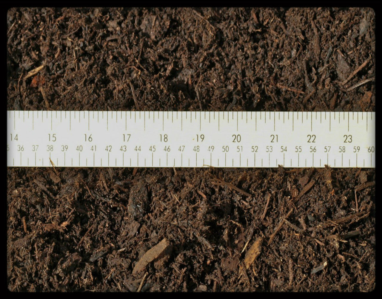 Composted Bark Mulch with ruler